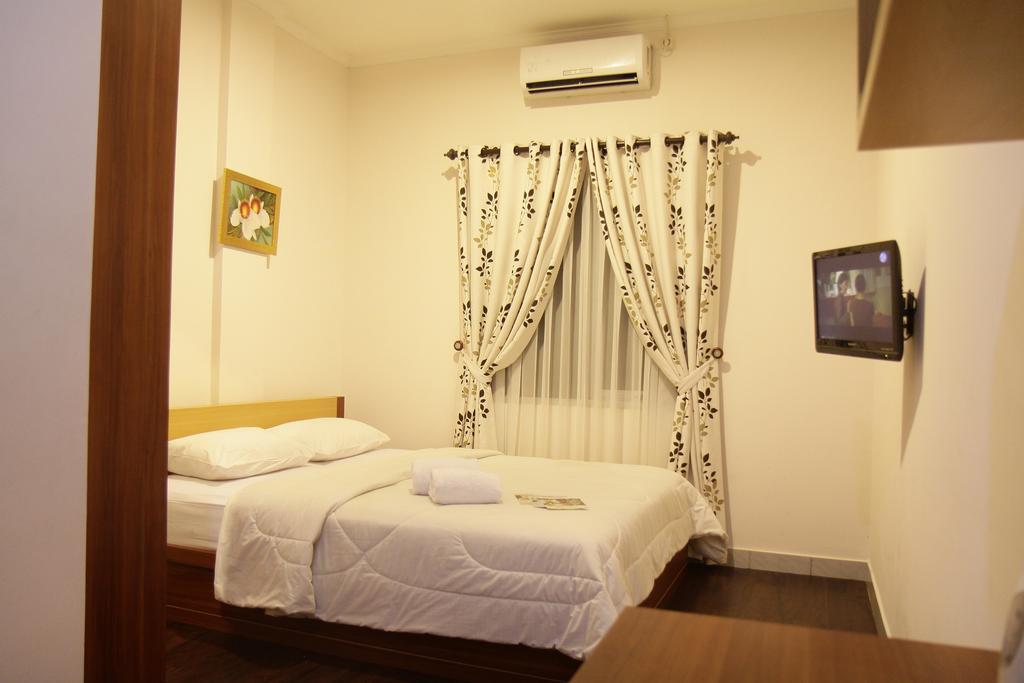Hotel Lotus Бандунг Номер фото